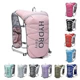 Lightweight Running Vest for Women and Men Hydration Backpack Pack with 1.5L Water Bladder Bag for Hiking Trail Running Gear Cycling Marathon (Pink)