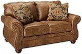 Signature Design by Ashley Larkinhurst Faux Leather Loveseat with Nailhead Trim and 2 Accent Pillows, Brown